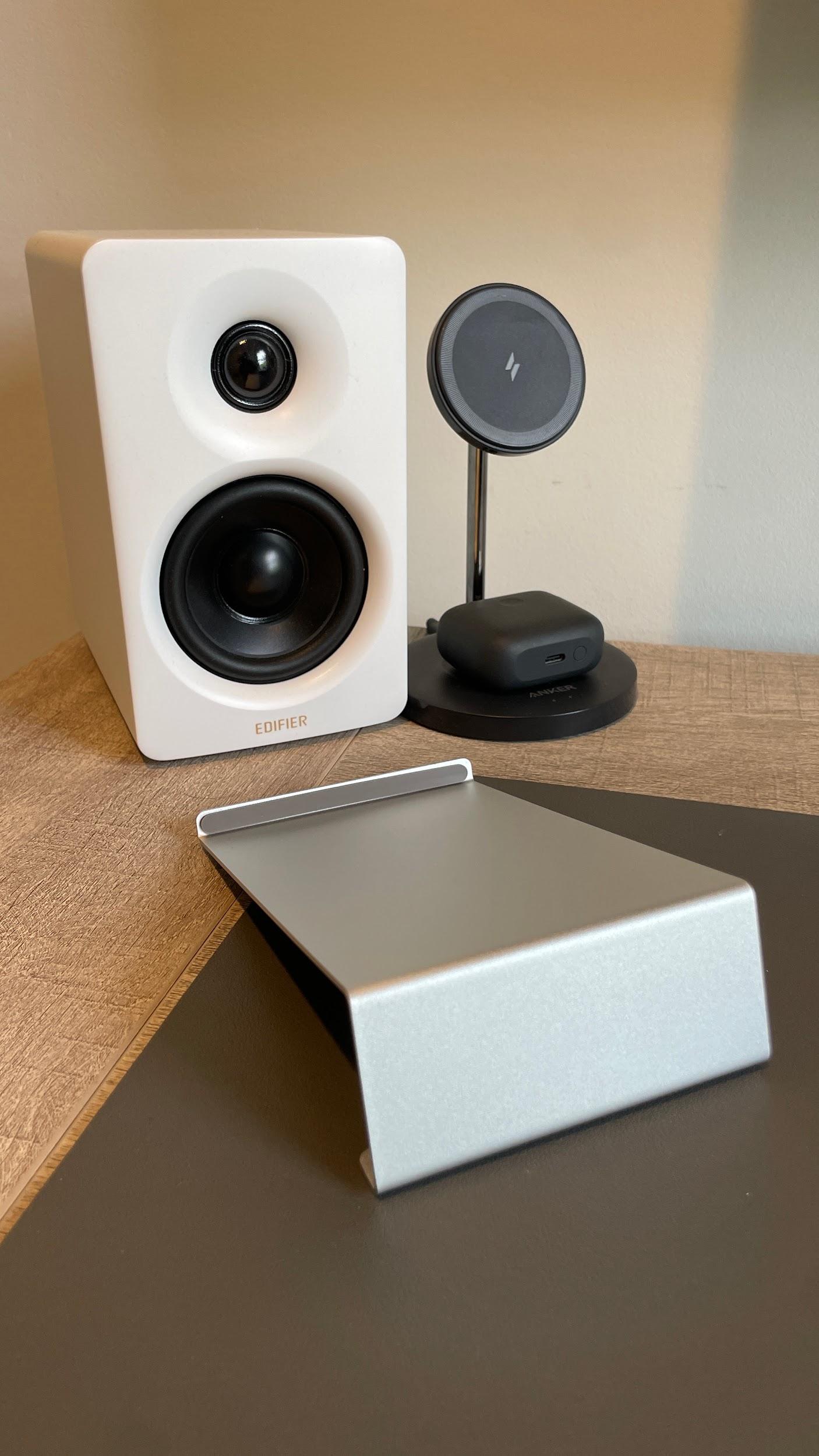 Edifier M60 on desk with included stand