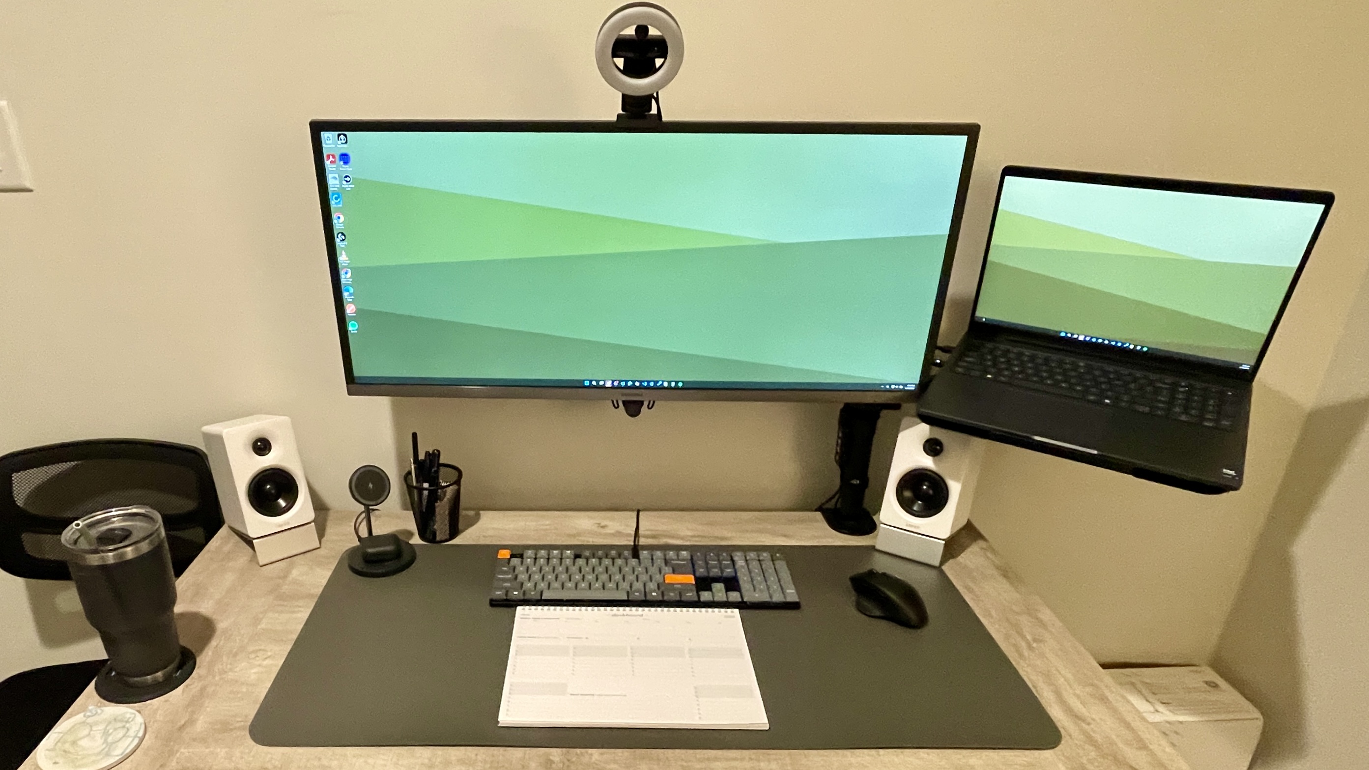 Keychron K5 Max in full desk setup with monitors