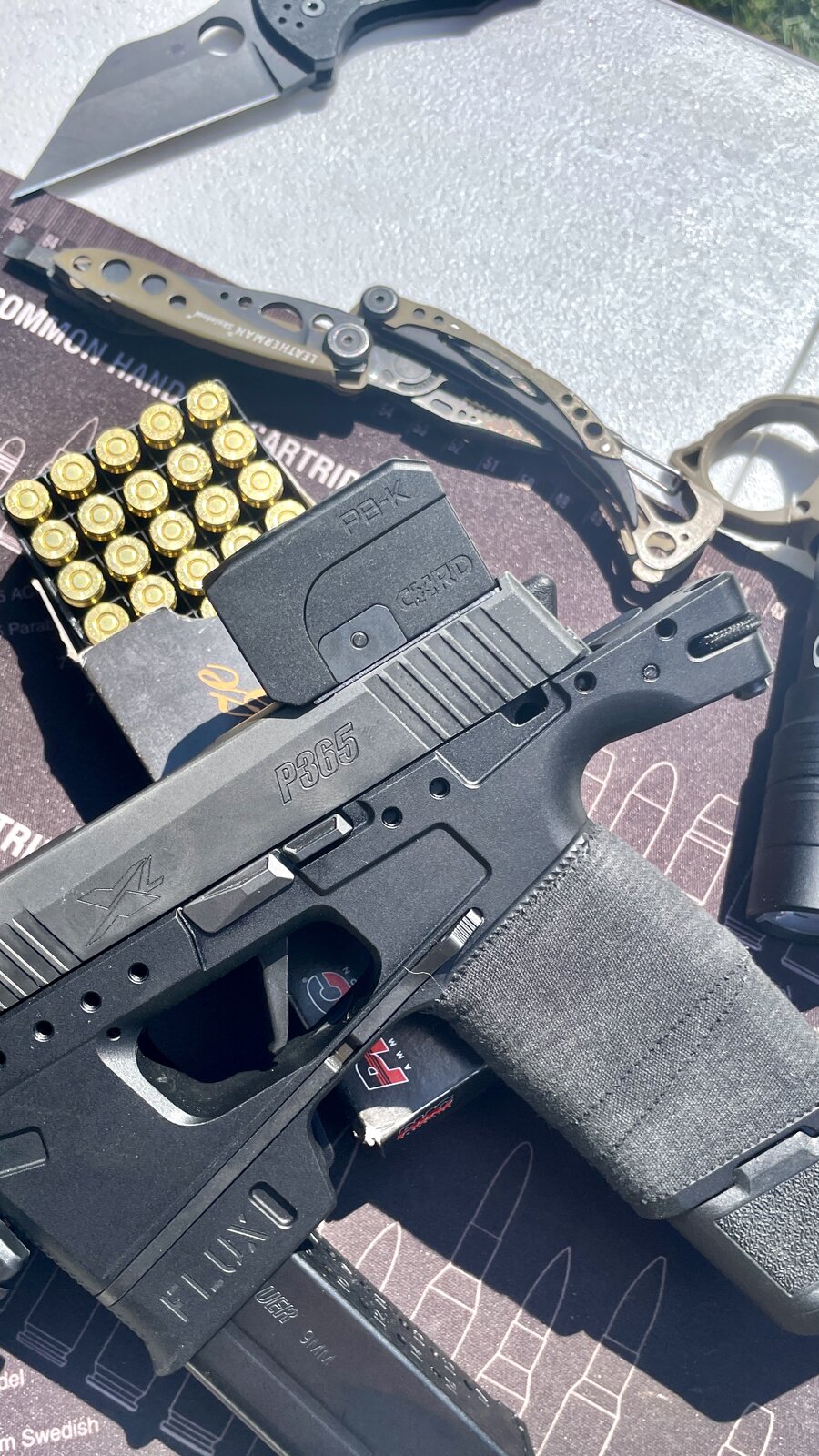 Lead & Steel Pandora PB-K mounted on a Flux Defense P365 Raider, laid out with EDC gear